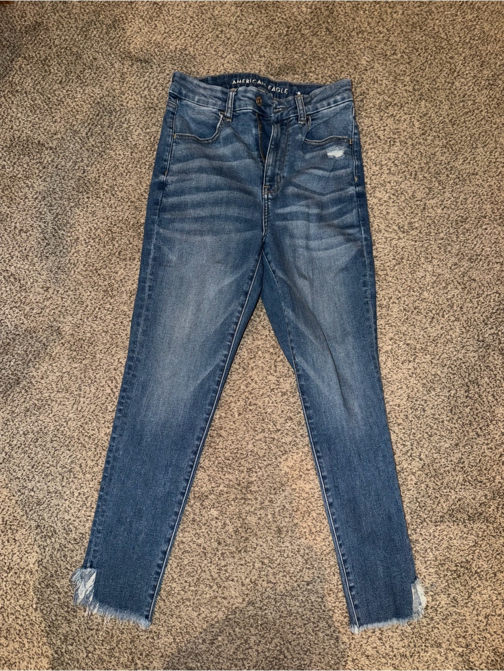 American Eagle Outfitters High-Rise Medium Blue Skinny Jeans with Frayed Hem